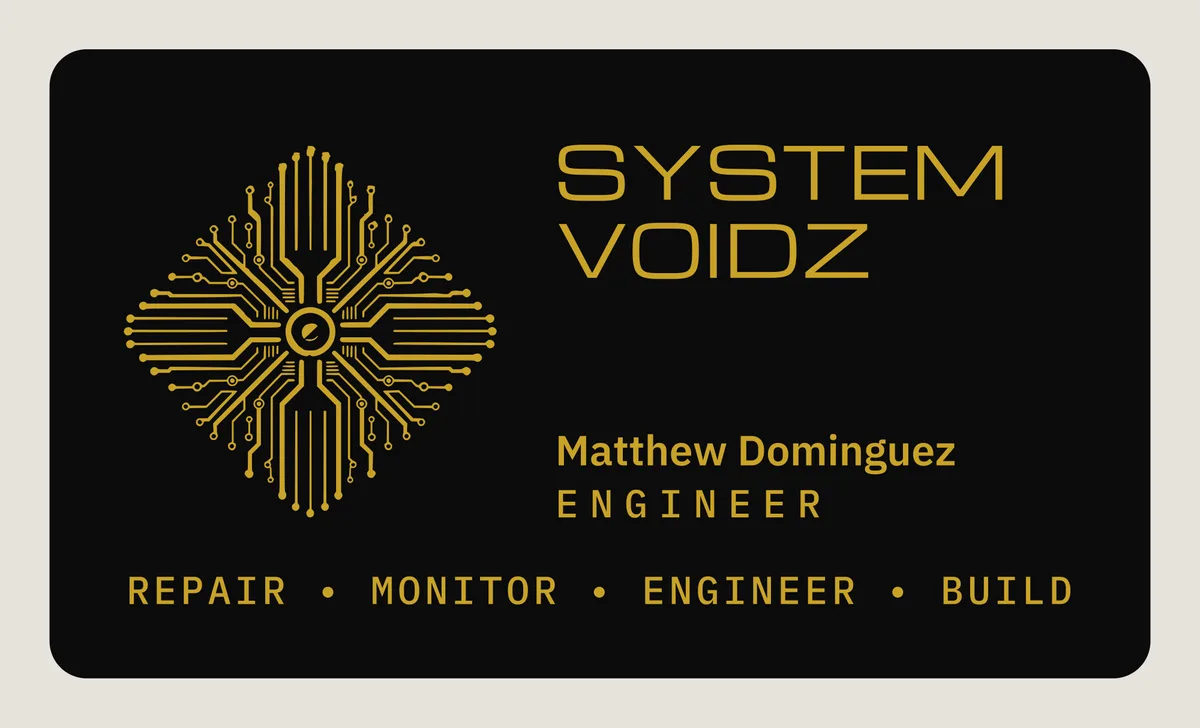Front of a black metal business card: the System Voidz circuit logo, the company name, a name and title, and the line Repair, Monitor, Engineer, Build, all engraved in gold-tone.